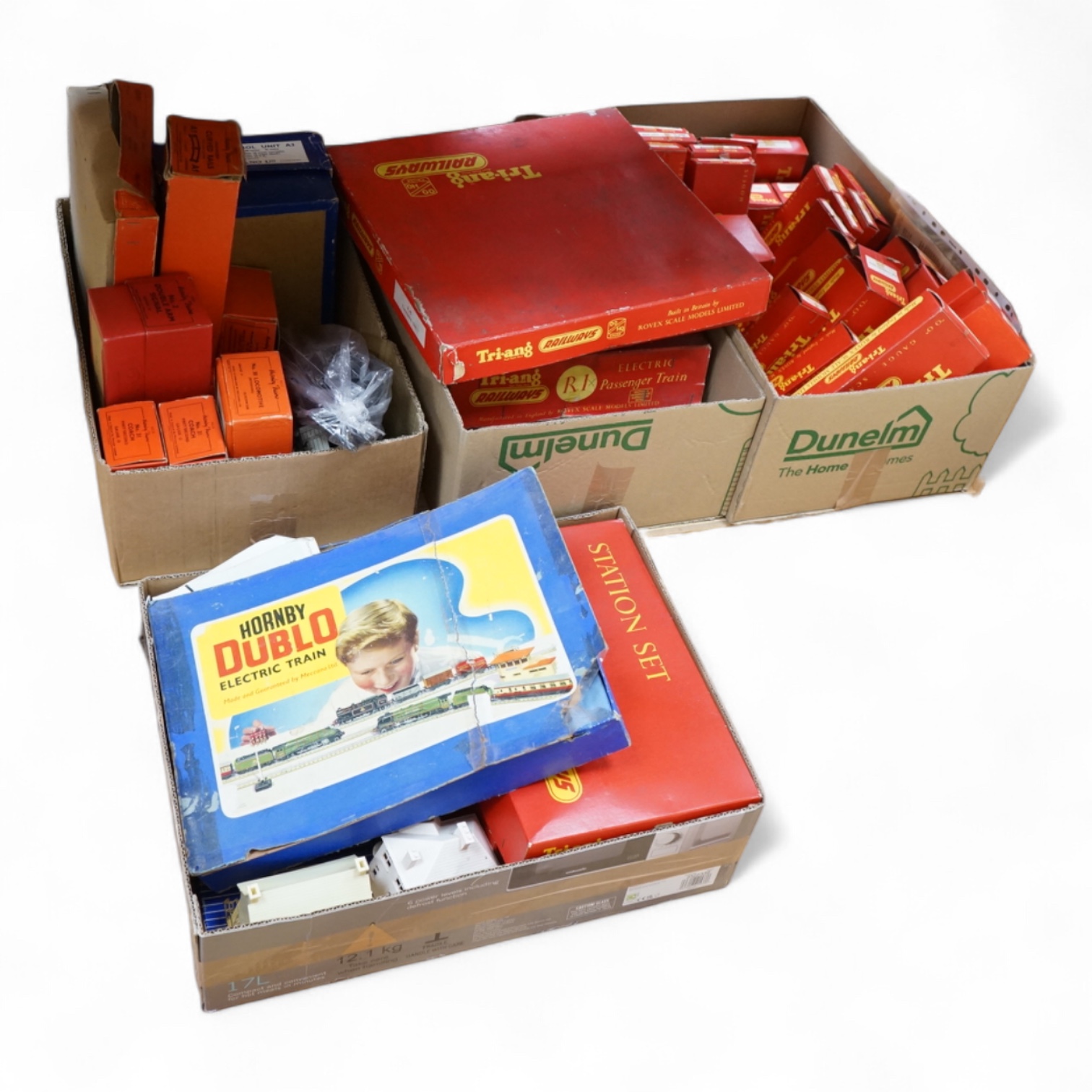 A quantity of boxed 00 gauge Tri-ang and Hornby Dublo railway together with a small quantity of Hornby 0 gauge clockwork model railway